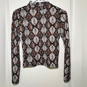 Snake print turtleneck